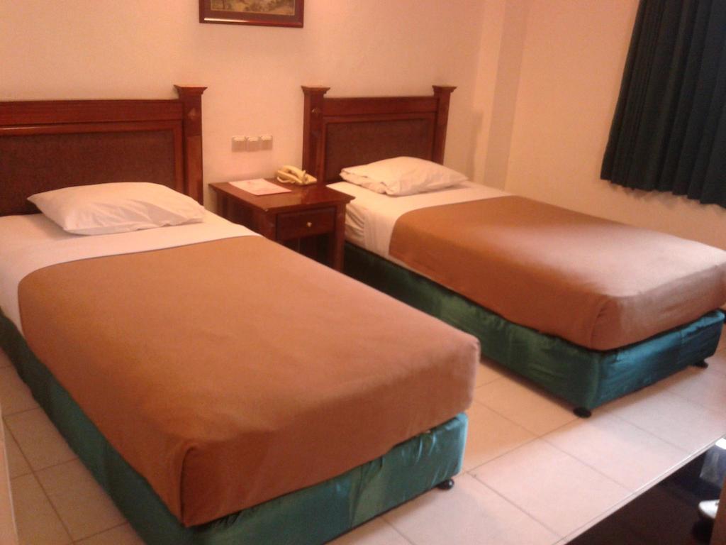 Hotel Fortuna Surabaya Værelse billede